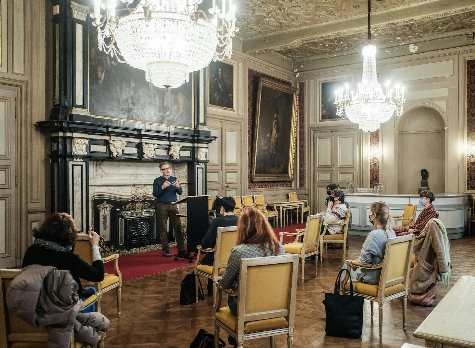 Jean-Claude Van Rijckeghem reads from his novel ‘Ironhead’ in the Austrian salon at Ghent town hall.